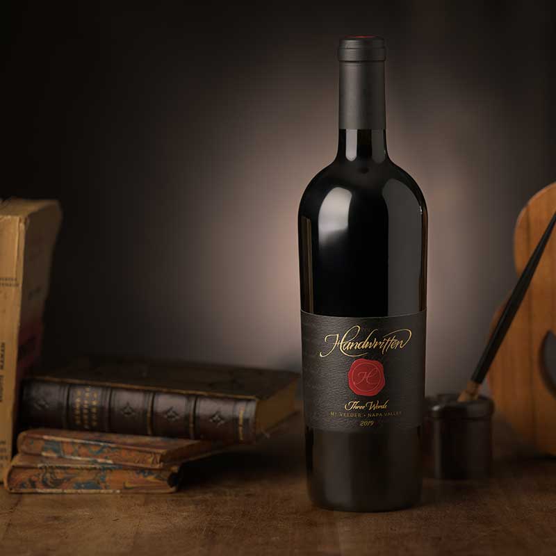 wine bottle and old books