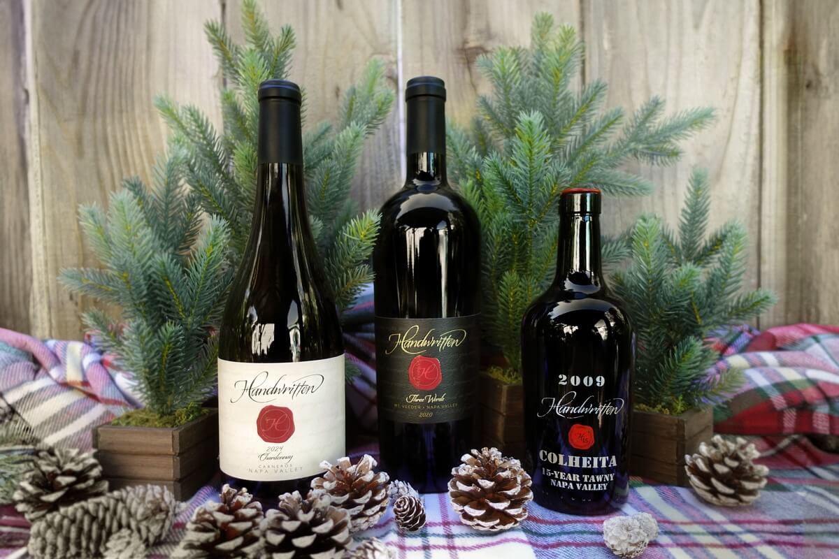 HW Dinner 1 three bottles of wine on festive table