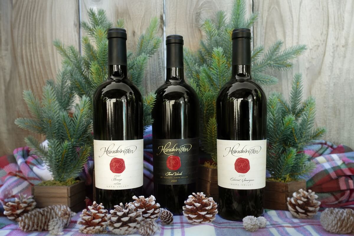 HW Reds 1 three bottles of wine on festive table